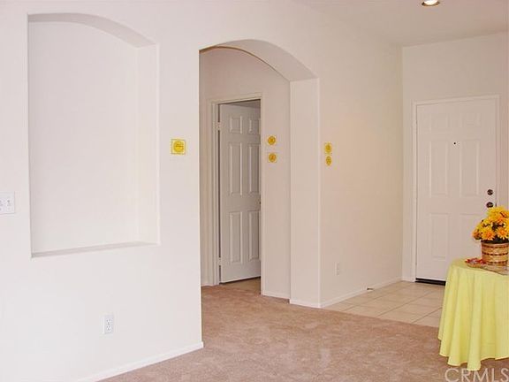 THROUGHOUT THE HOME THERE ARE BUILDER EXTRA's SUCH AS BULL NOSE CORNERS, DECORATOR NICHEs, ARCHED DOORWAYS. THIS SIDE TAKES YOU TO THE GUEST BEDROOM AND FULL GUEST BATH.