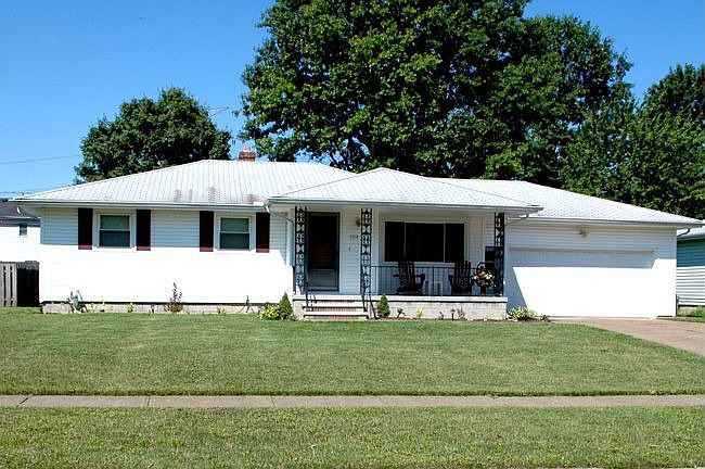 Front, porch, double garage