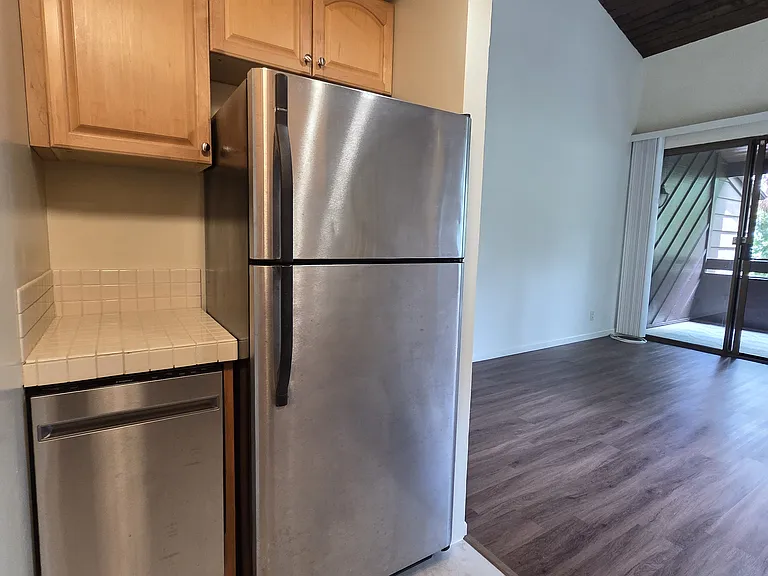 Stainless Steel Appliances, New Flooring and Dishwasher