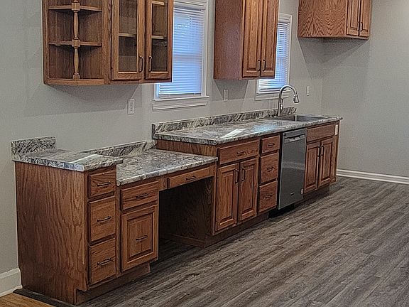 Kitchen, with new dishwasher, sink, faucet, and LVP flooring