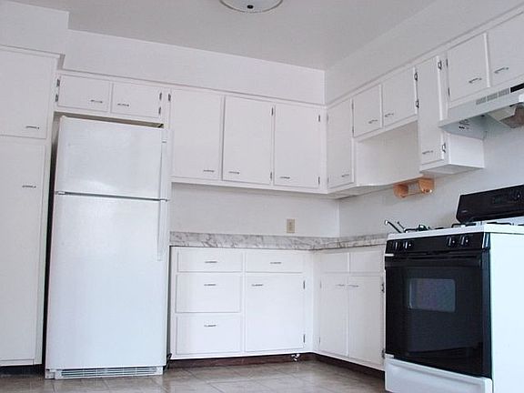 Giant kitchen with excessive cabinetry