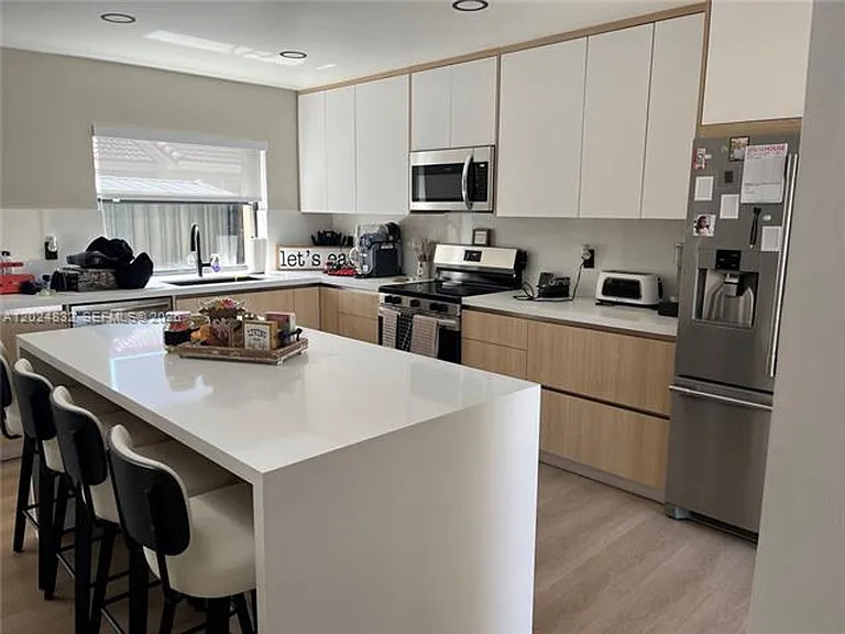 6538 NW 170th Ln #Townhouse 6538 — Photo 1