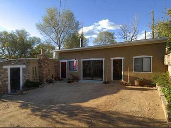 Front Door, Garage and Parking Area