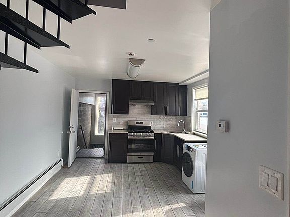 4th image of 65-61 Hull Ave #1