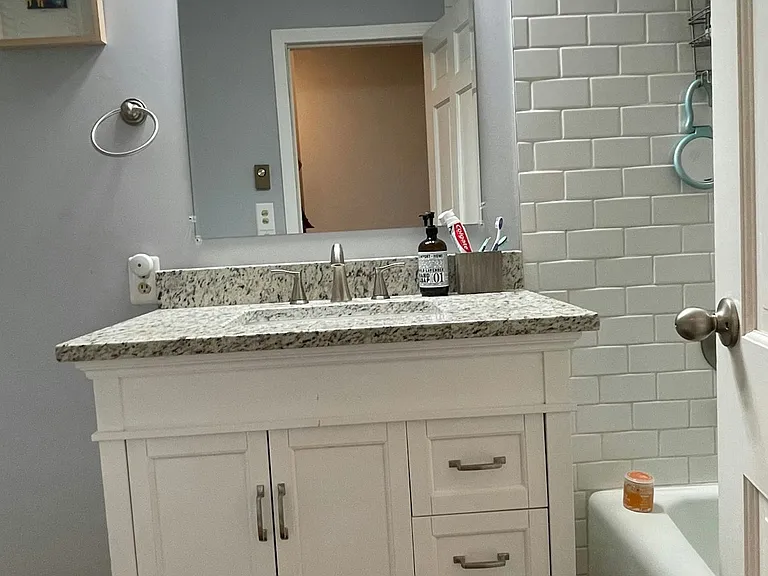 Large full bath with Granite top vanity