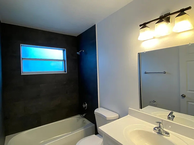 second bathroom with all new bathtub and countertop
