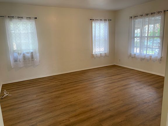 Spacious living room filled with natural light