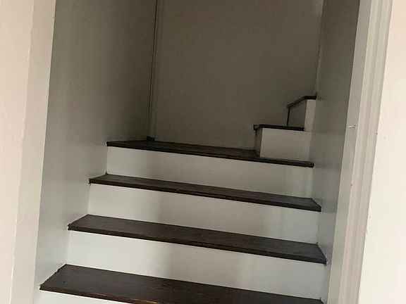 Stairs to attic (located in bedroom 3)