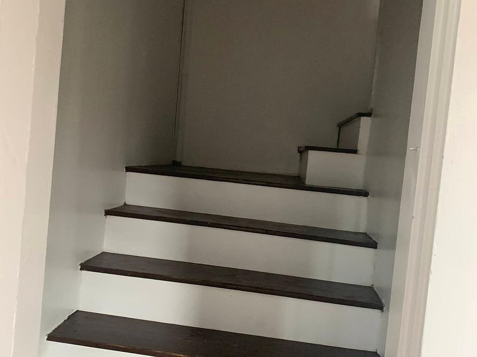 Stairs to attic (located in bedroom 3)