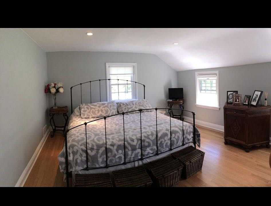 Upstairs large bedroom with 3 closets one of them is a cedar closet.
