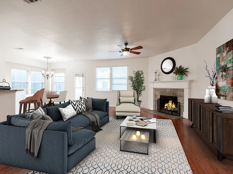 Virtually Staged Family Room with fireplace and open to kitchen and breakfast nook