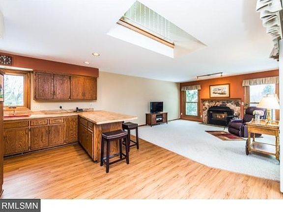 View from dining room looking in to the kitchen and family room.