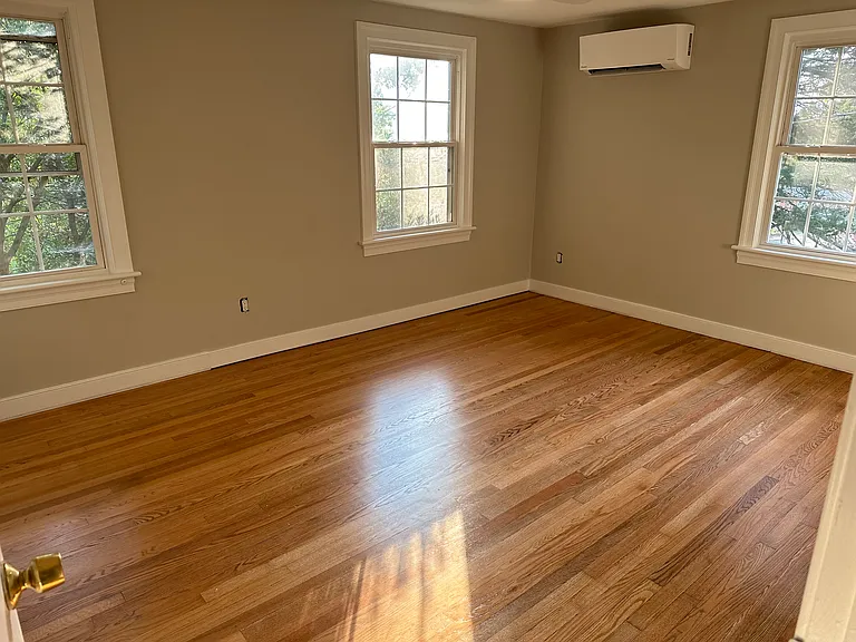 primary bedroom large enough for king bed. new ceiling fan with light and remote. refinished hardwood floors and painted top to bottom.