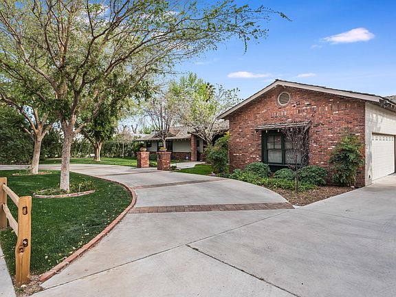 Circular Driveway and 2 Car Garage