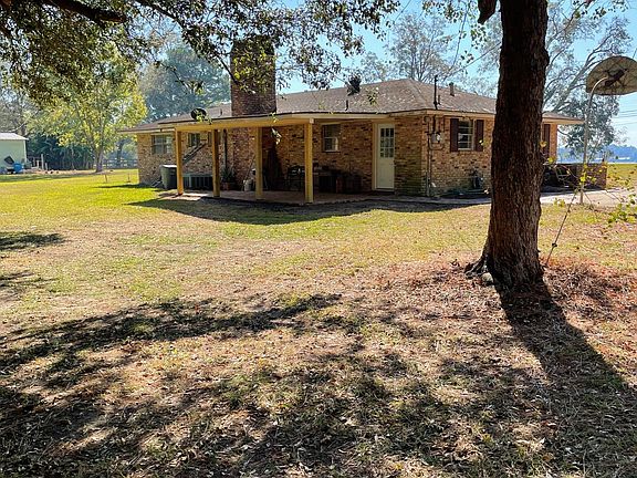 Back covered patio for relaxing or BBQ