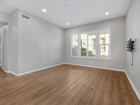 Open Concept Living with Kitchen open to living room! Plantation Shutters & Lots of Natural Light!