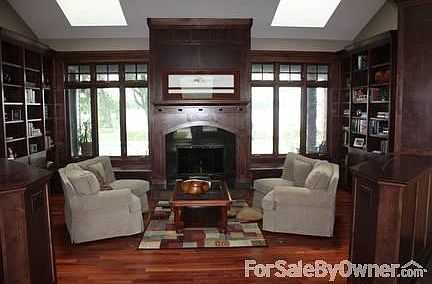 The Library
						:
						Off the entry foyer, a custom library with floor to ceiling shelves & cabinetry.