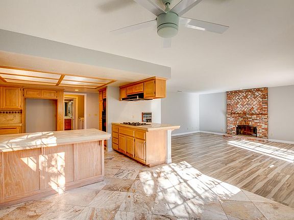 Great open space living area with the spacious kitchen, family room that opens up to the large backyard and generous family eating nook.