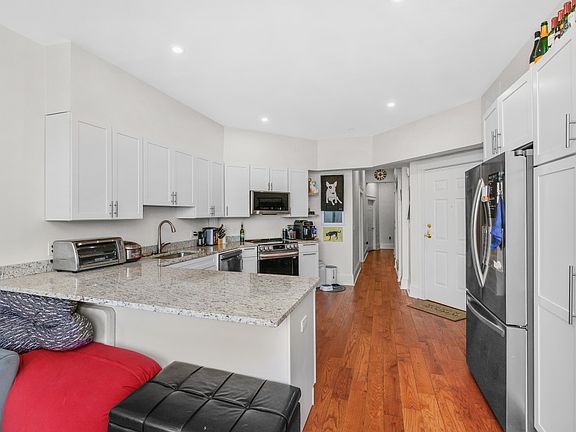 Open living room to updated kitchen