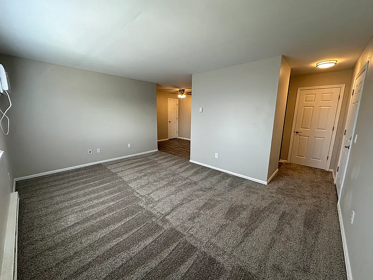 Two Bedroom Renovated Spacious Living Room (Entry Closet to Right and Separate Dining Area to Left)
