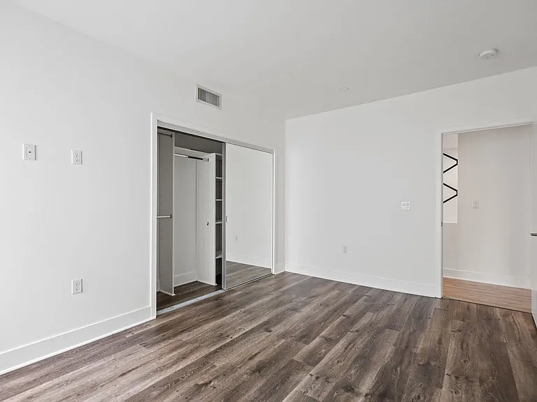 Bedroom with Closet with Shelving