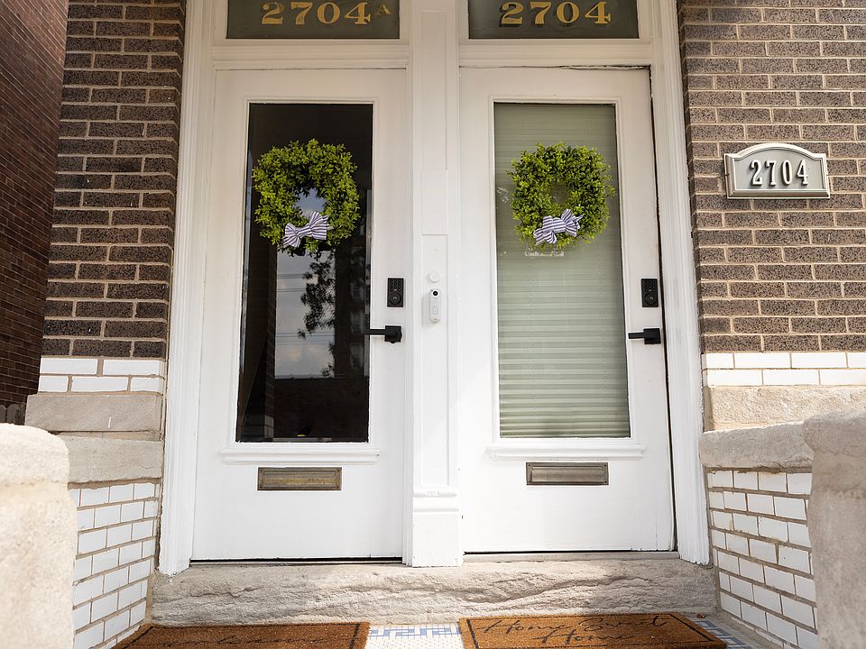 Front door with keyless entry and video doorbell