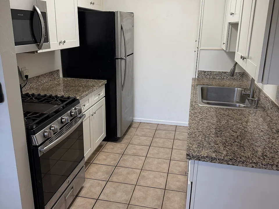 Upgraded Kitchen including dishwasher, microwave and stainless appliances