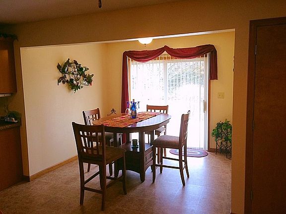 Dining Room
						:
						Sliding door leading out to deck