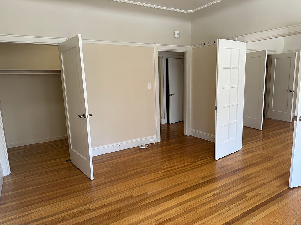 Closet door, French doors, linen closet in hall past hall door frame