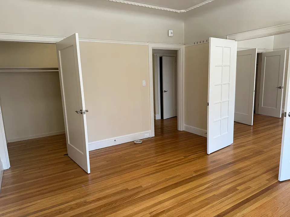 Closet door, French doors, linen closet in hall past hall door frame