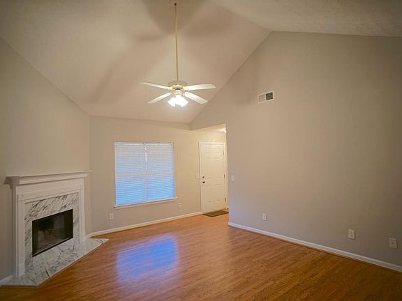 Living room with vaulted ceilings