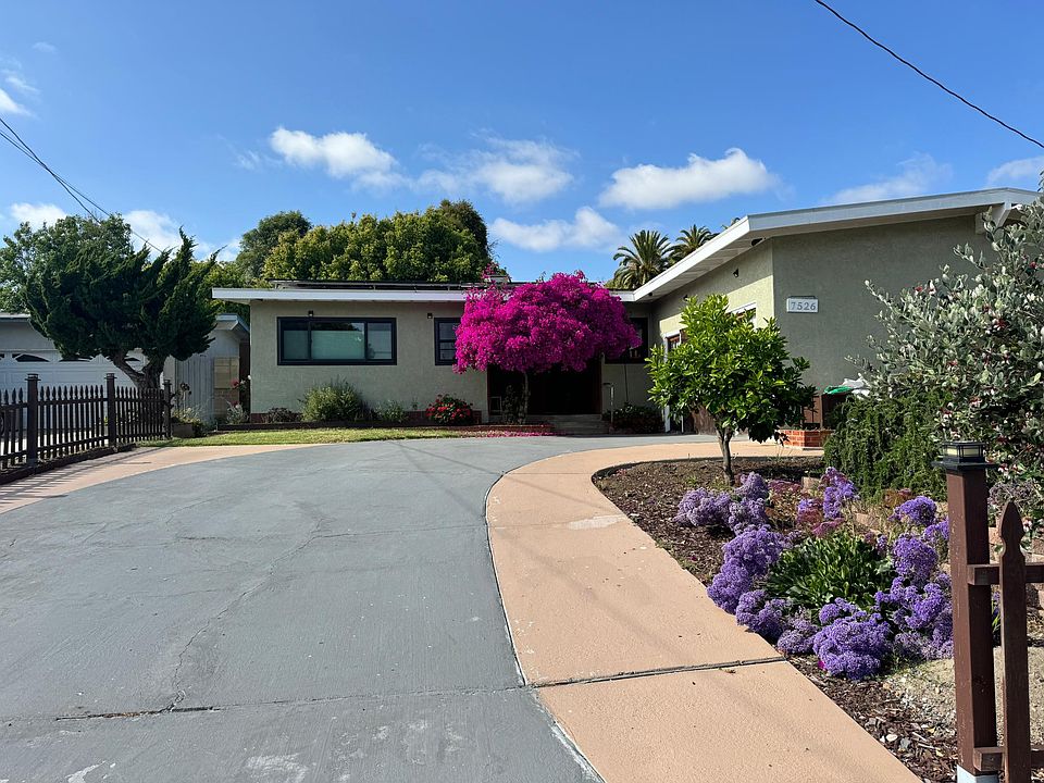 Front view of house with large driveway