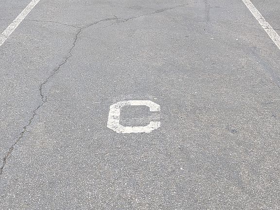 Parking space, outside, no cover, two cars only