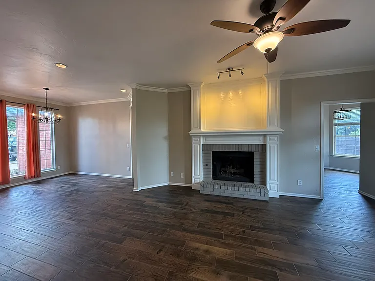 Cozy Fireplace ...looking ahead to Christmas! To the left is the formal dining room. To the right, is the breakfast nook through the walkway.