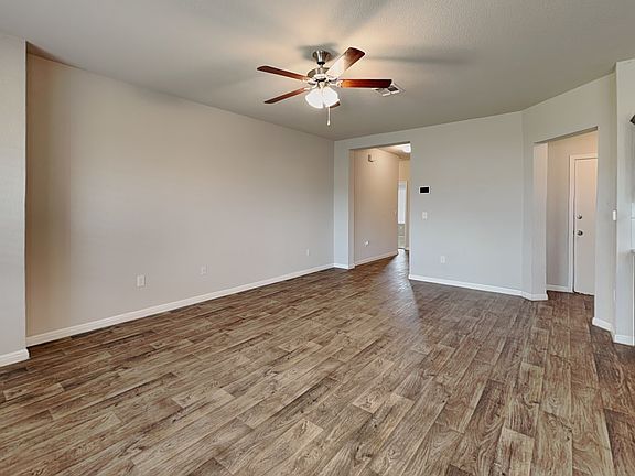 Spacious living room with neut