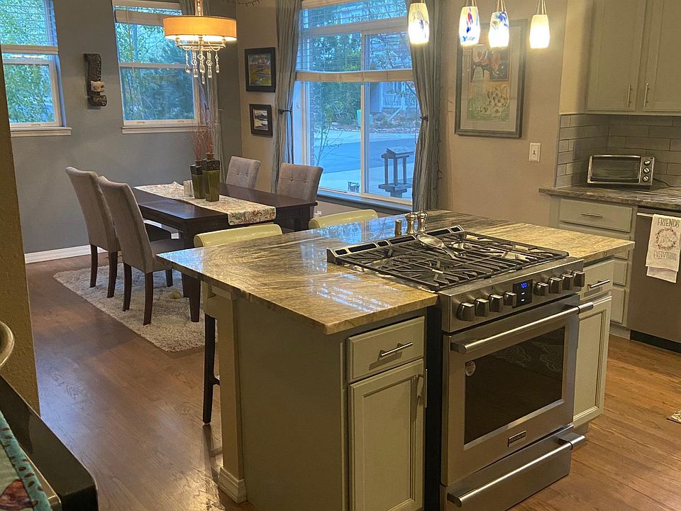 Beautiful countertops, all stainless appliances. Washer and dryer conveniently located in pantry in kitchen