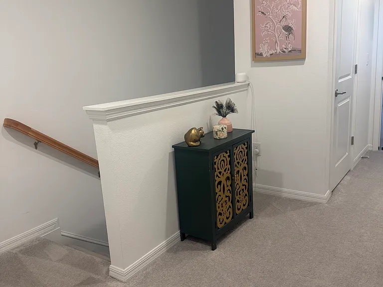 Upstairs landing with linen closet.