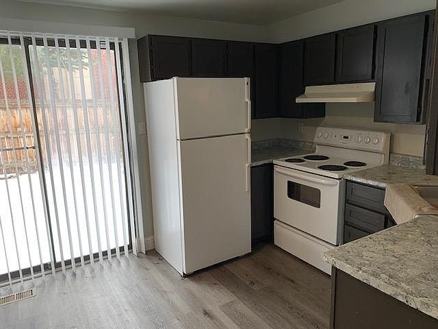 Kitchen w/access to backyard