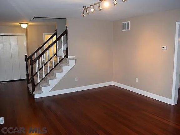 Entrance, stairs, and family room 1
