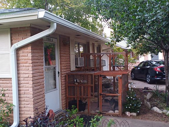 Entry Door (Cat Condo has been removed), and Parking near One Car Garage