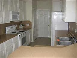 Frig stays with town home