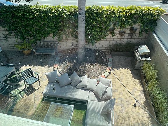 View of backyard from upstairs bedroom windows.