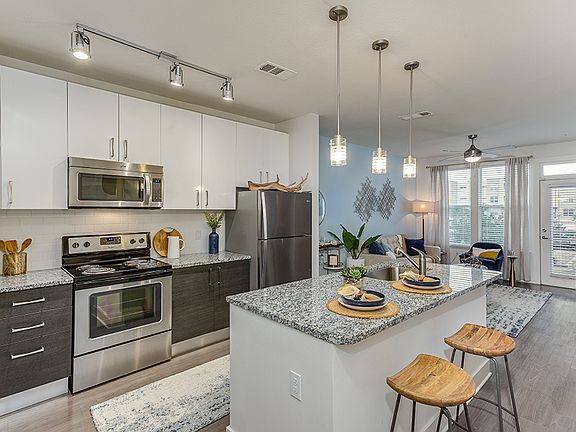 Imported High Gloss Cabinetry and Pendant Lighting