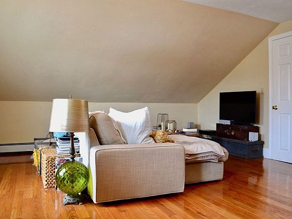 Gleaming hardwood floors and neutral paint colors throughout