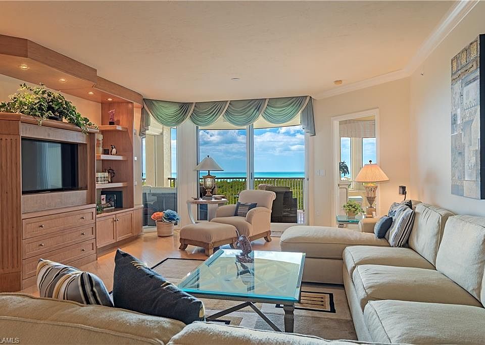 1st image of 7117 Pelican Bay BLVD #701