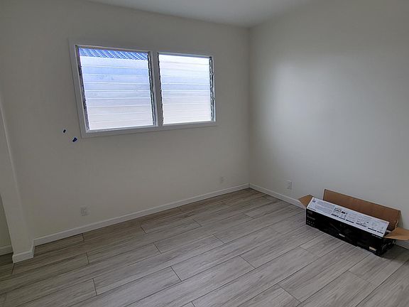 Bedroom unfunished before fan was installed