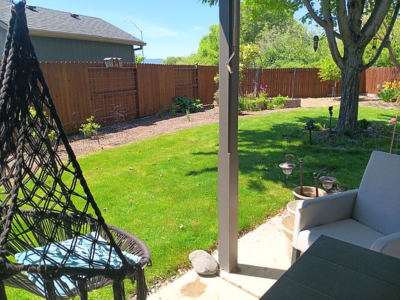 Side Yard w/ Swing Chair & Blueberries