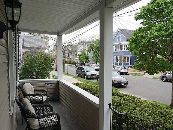 Partially enclosed front porch