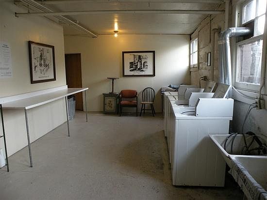 Large laundry in the garden level of the building.