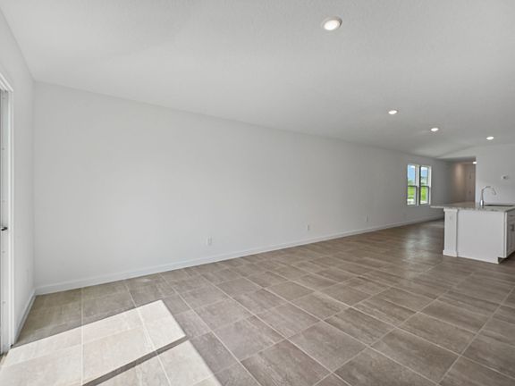 Great room of the Everglade plan at Lakes at Bella Lago.